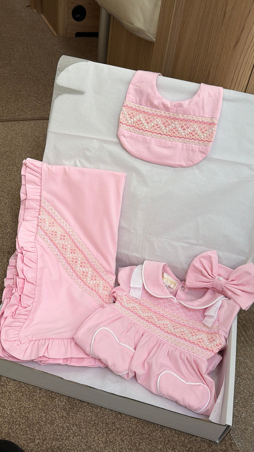 Pink smocked Babygrow set
