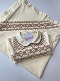 Cream smocked Babygrow set