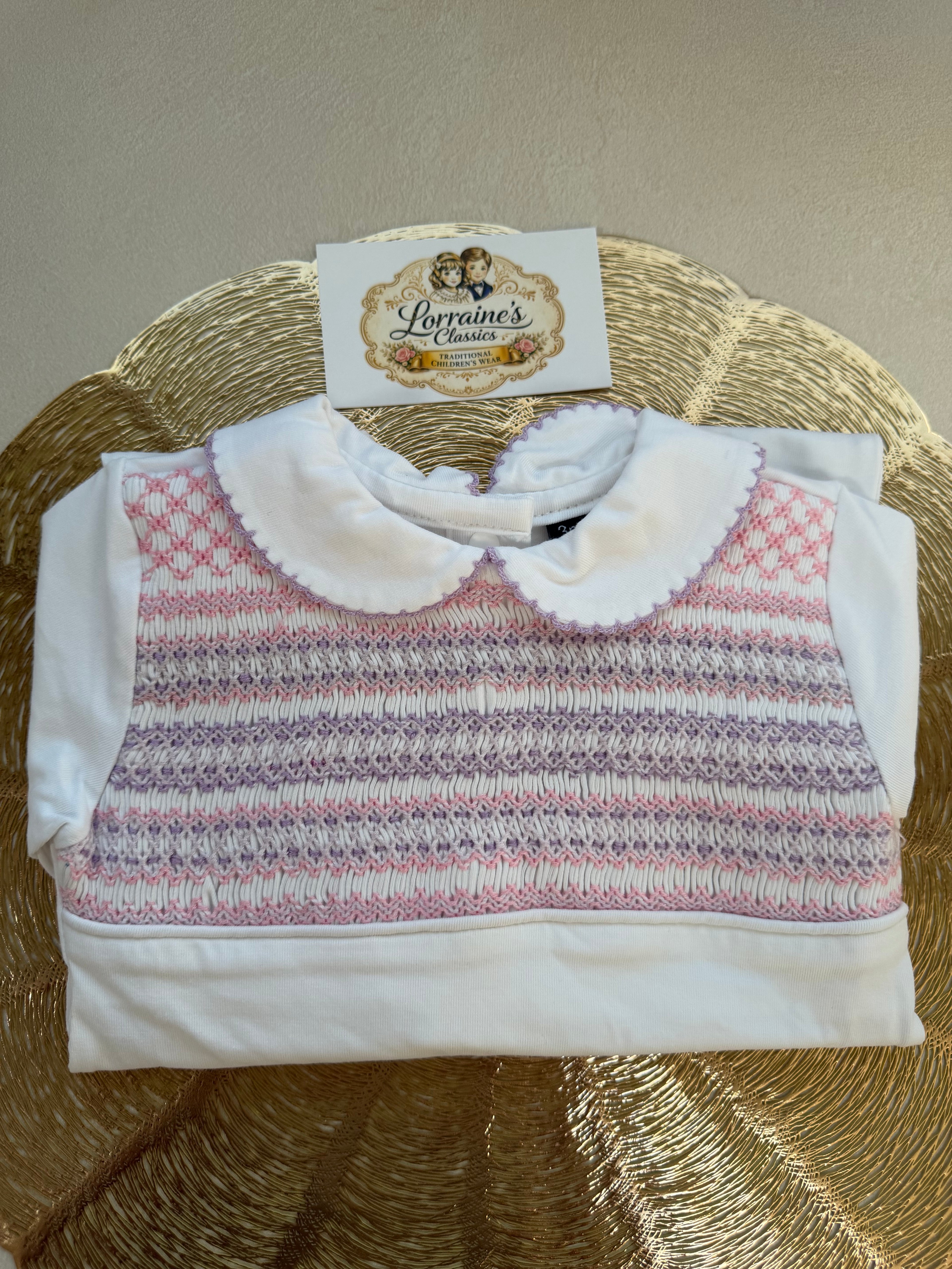 Girls smocked Babygrow
