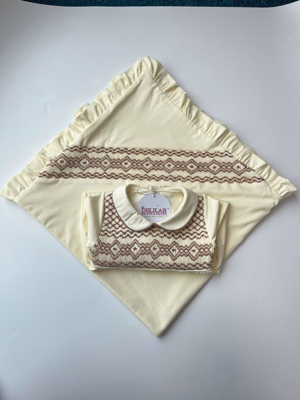 Cream smocked Babygrow set
