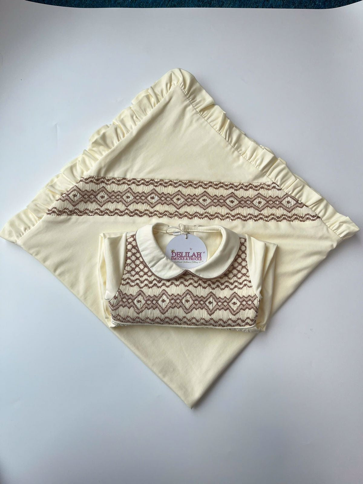 Cream smocked Babygrow set