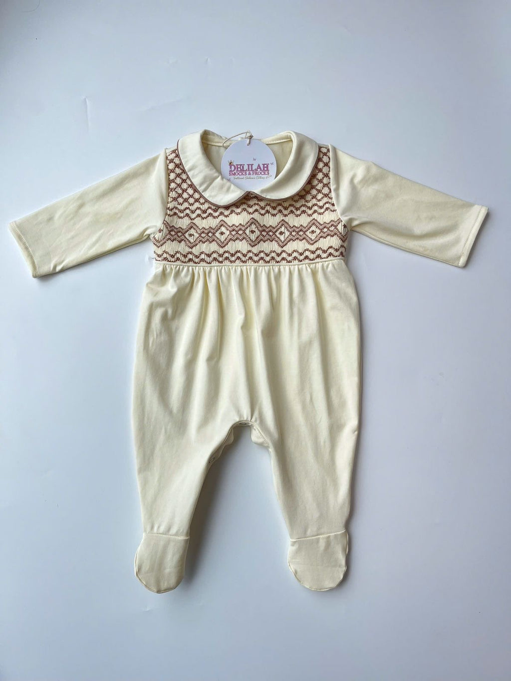Cream smocked Babygrow set